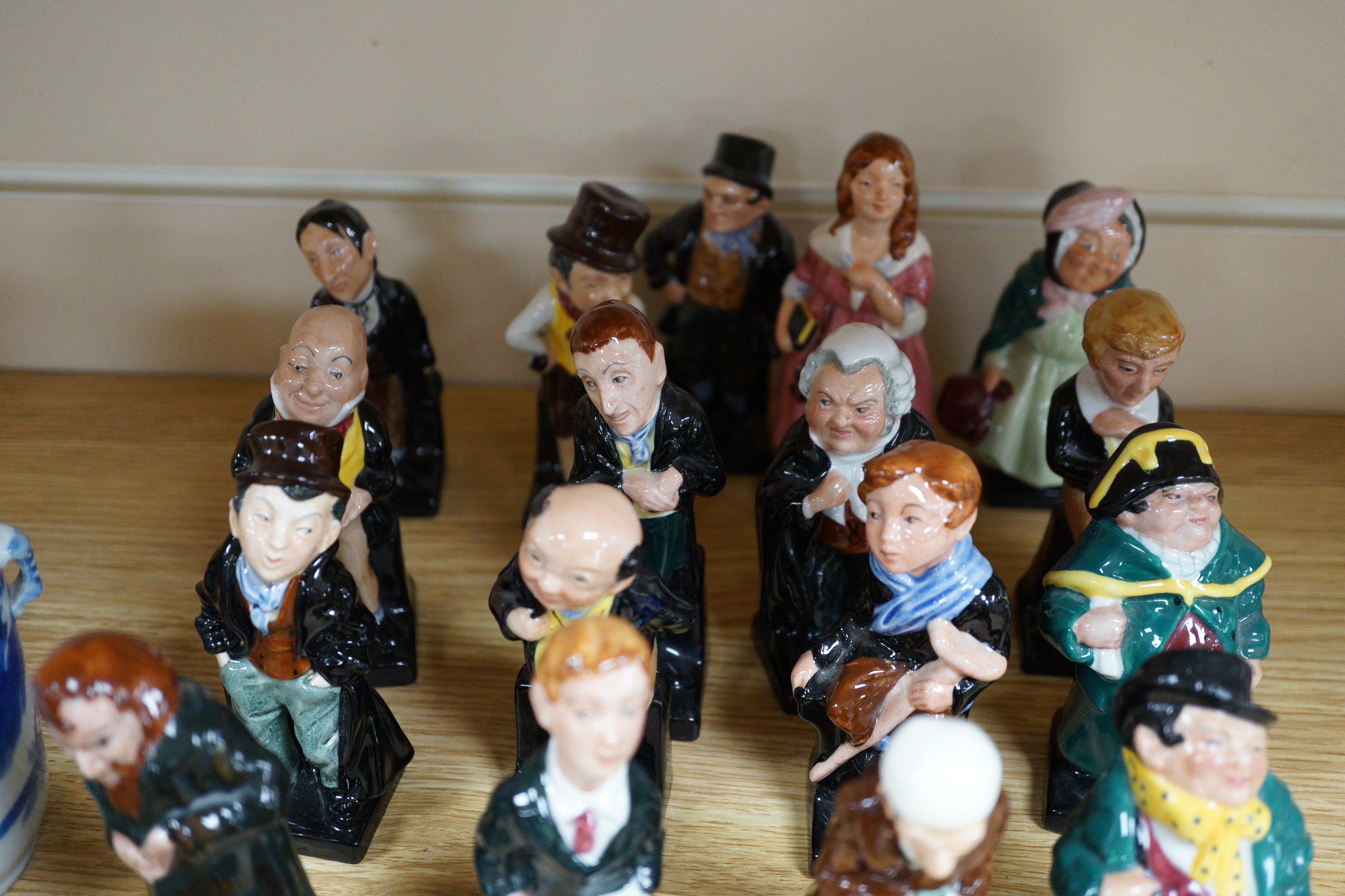 A group of twenty five Royal Doulton Dickens characters